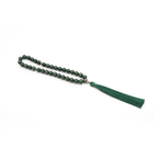 Close-up of green blackwood meditation beads with gold silver leaf lacquer