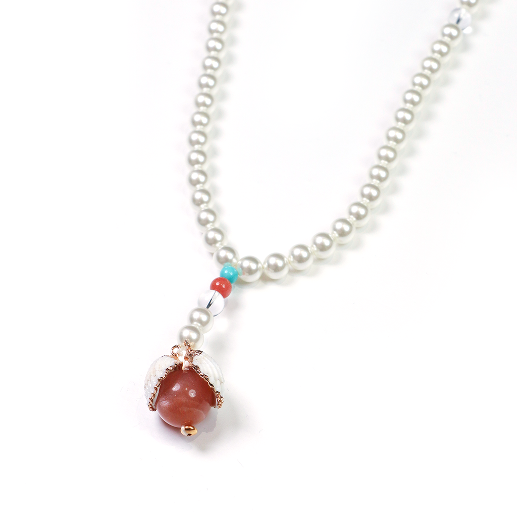 Awareness Presence bracelet with pearl beads and turquoise accent on white background