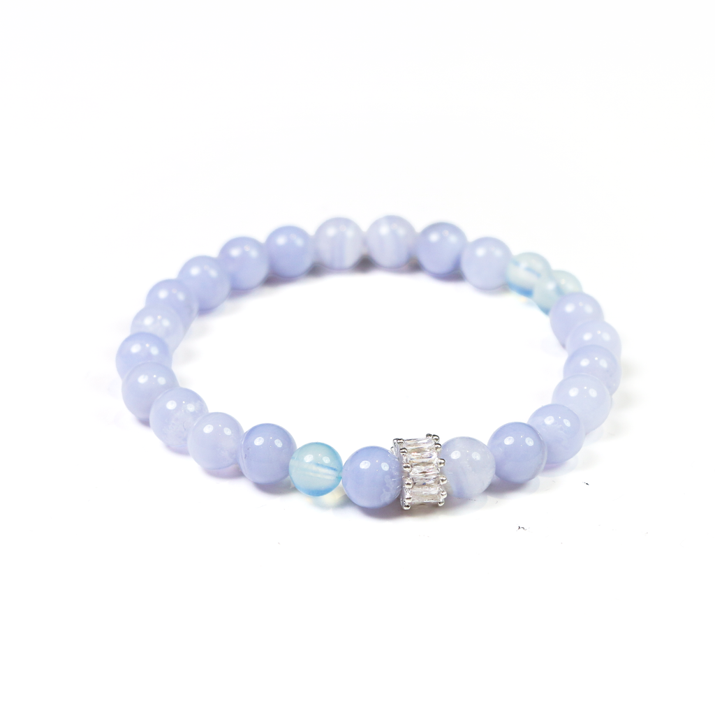 Close-up of smooth crystal beads on Beluga whale inspired bracelet