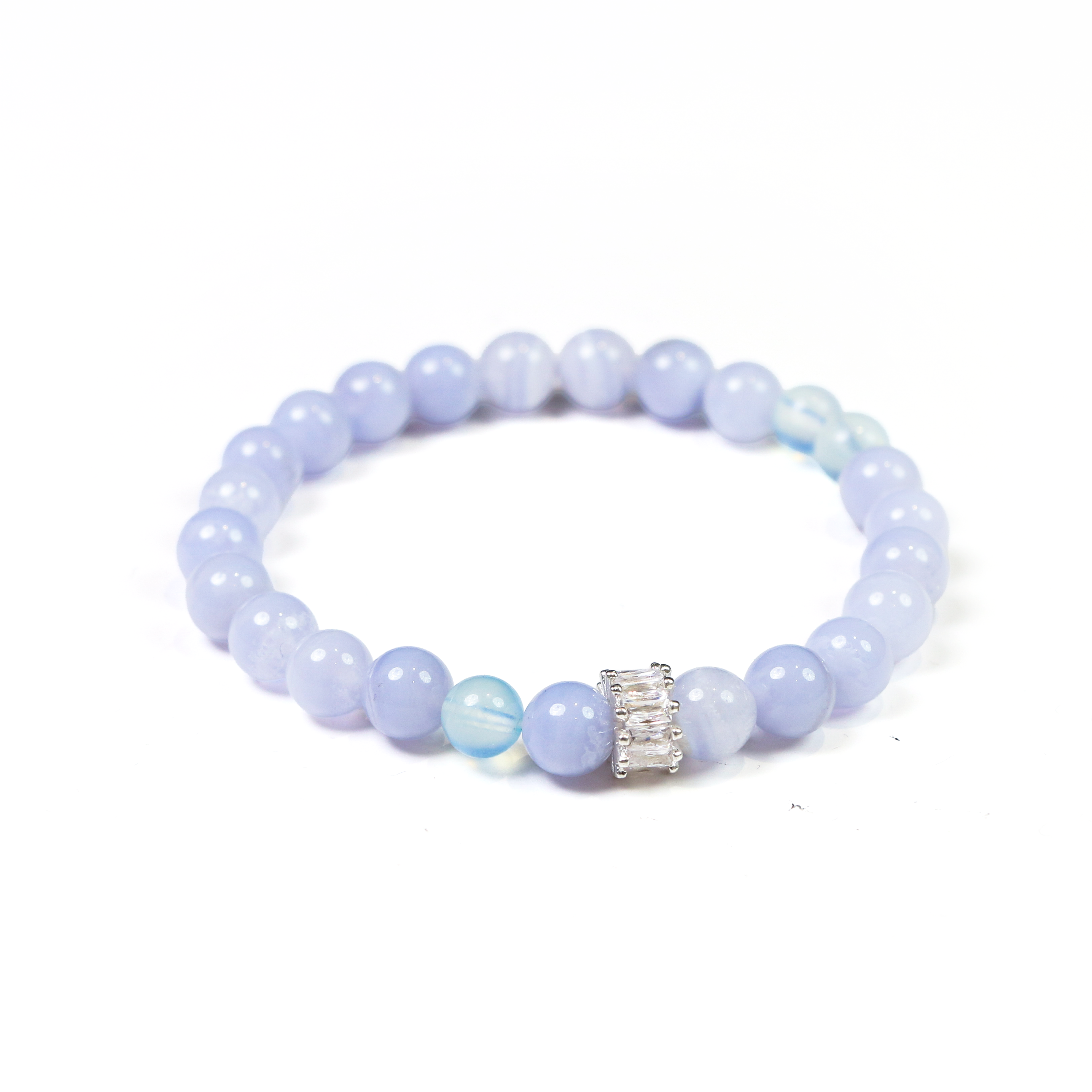 Close-up of smooth crystal beads on Beluga whale inspired bracelet
