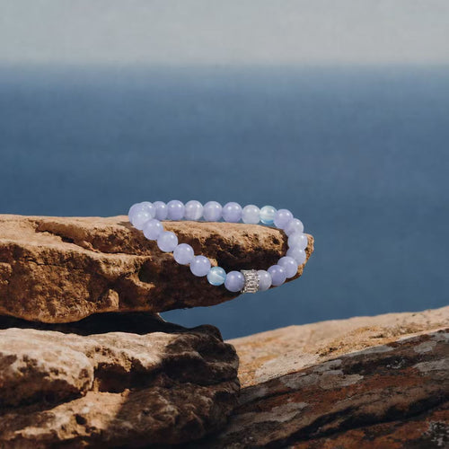 Beluga bracelet on a rock with ocean in the background