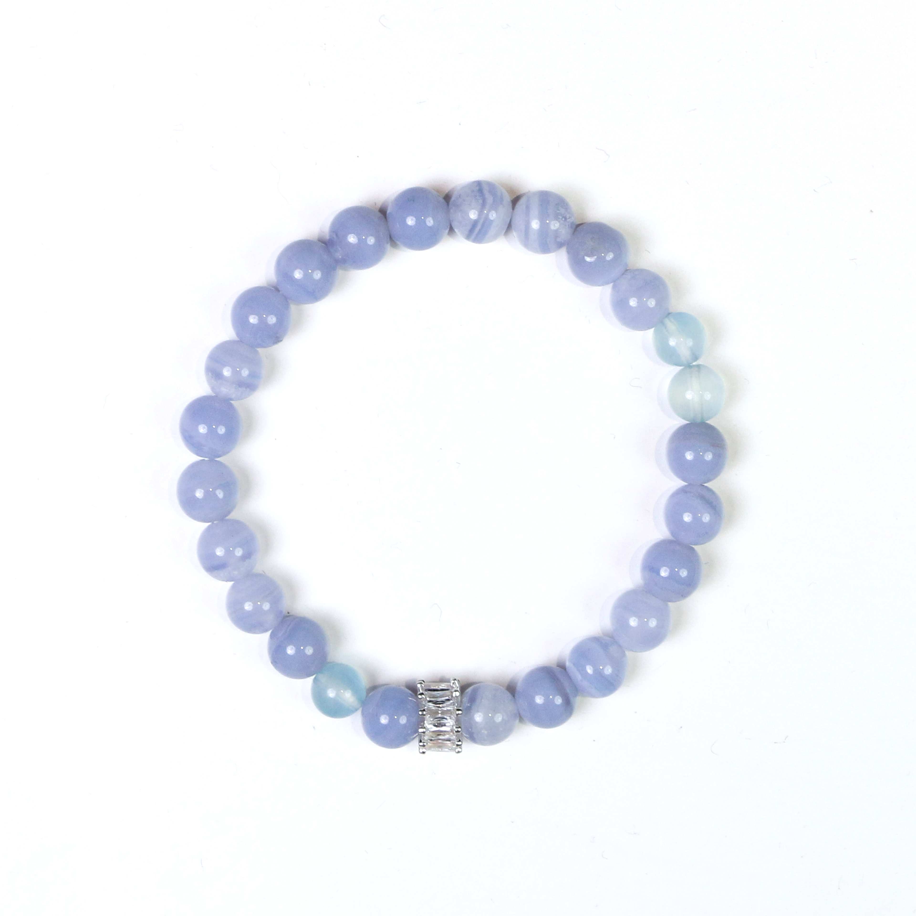 Beluga whale bracelet with ocean-blue crystal beads representing arctic whale energy