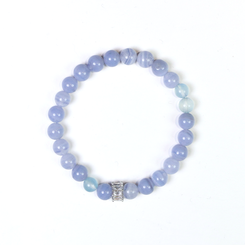 Beluga whale bracelet with ocean-blue crystal beads representing arctic whale energy