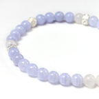 Detail of Blue Lace Agate beads and 925 Silver tassel detail close-up