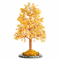 Handcrafted citrine crystal tree with golden amber leaves on copper wire branches, agate base