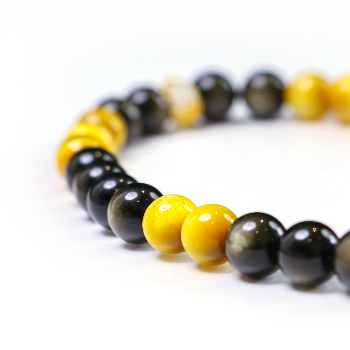 Golden obsidian and tiger eye crystal beads for clarity and action energy