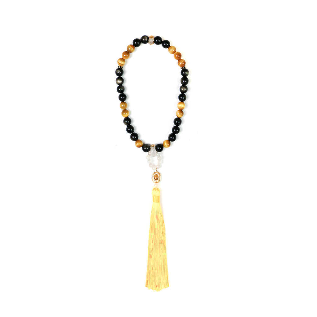 Clarity + Action meditation bracelet with golden obsidian and tiger eye beads on white background