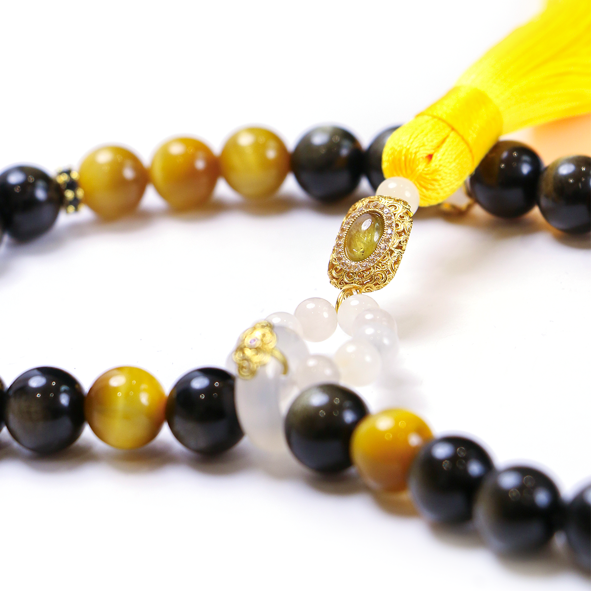 Meditation bracelet with reflective golden obsidian mirror-like beads