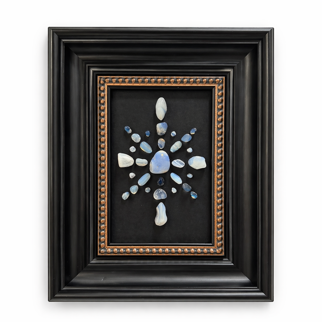 Blue Lace Agate crystal star frame with misty blue and white beads on white background