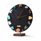 Decorative clock with colorful crystals on a black face