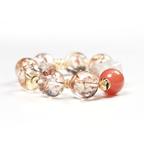 Close-up detail of beads on the Flamingo bracelet.