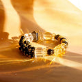 Handcrafted Gold Edge Bracelet with golden citrine and clear quartz beads in natural sunlight