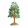 Green Aventurine crystal tree with copper wire branches on agate base in natural light