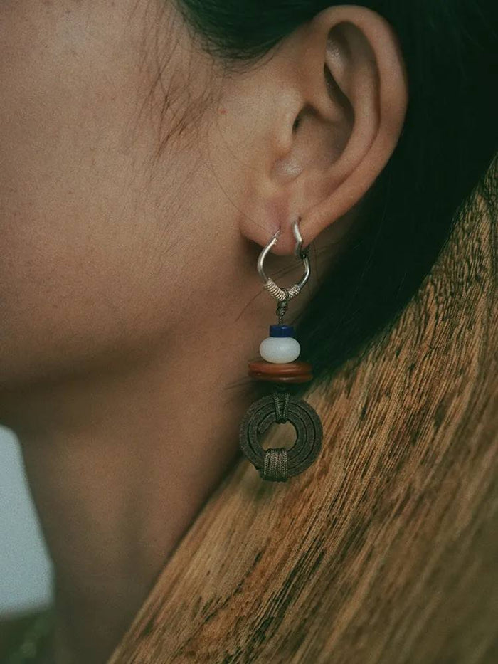 earrings worn