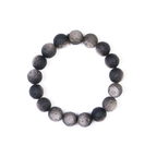 Owl bracelet with 17 silver obsidian lunar crescent beads on white background