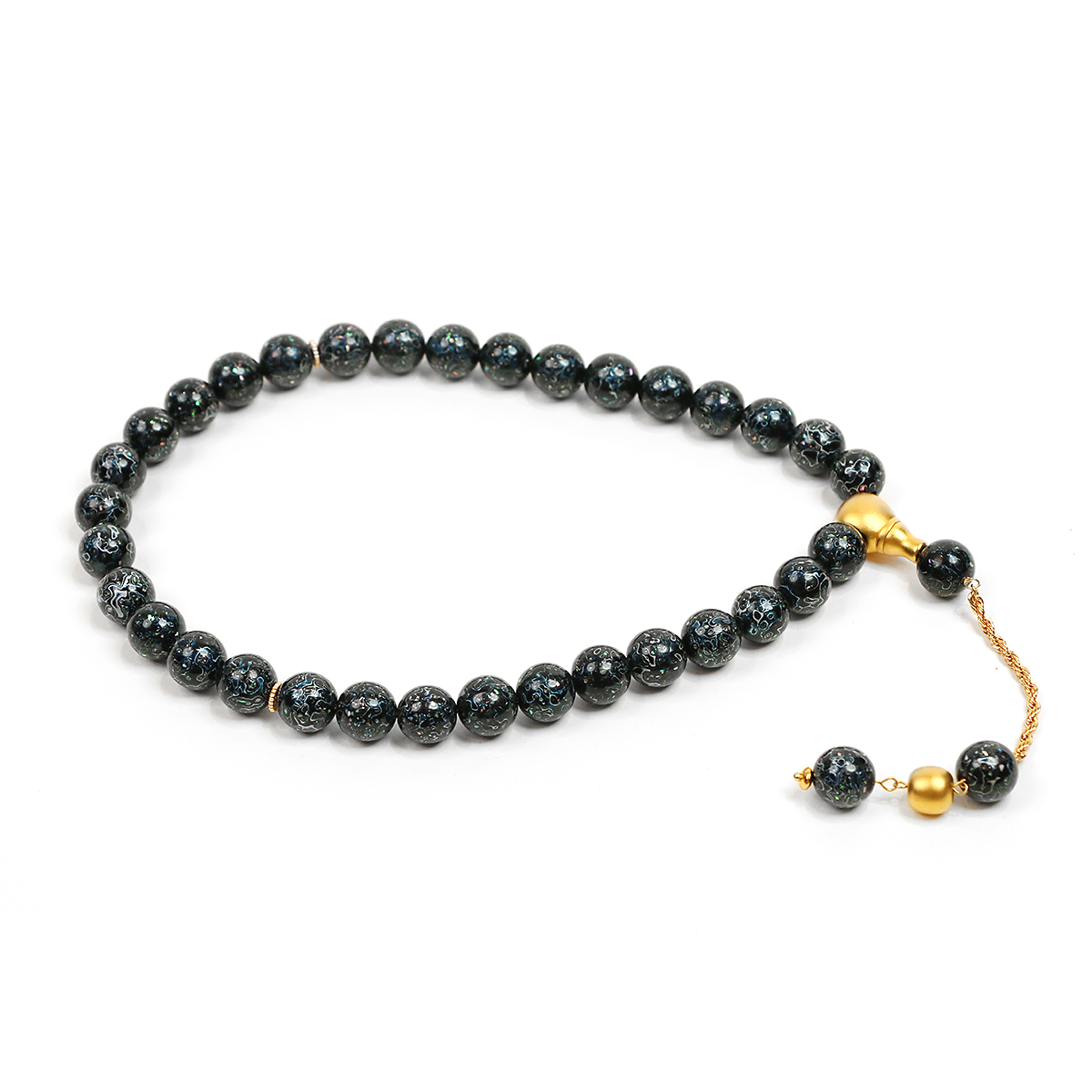 Practice Mastery bracelet with blue blackwood beads and gold accents on white