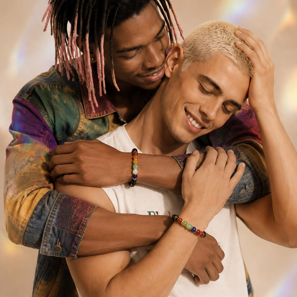 Two people embracing each other with a warm, soft light background