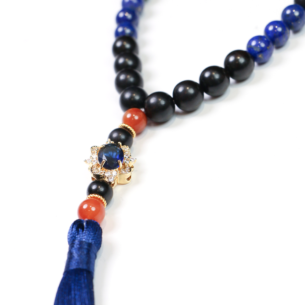 Reason + Clarity meditation bracelet with multicolored rutilated quartz tassel detail