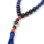 Reason + Clarity meditation bracelet with multicolored rutilated quartz tassel detail