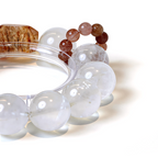 Close-up of Turritopsis Nutricula bracelet showing white phantom quartz layered inclusions