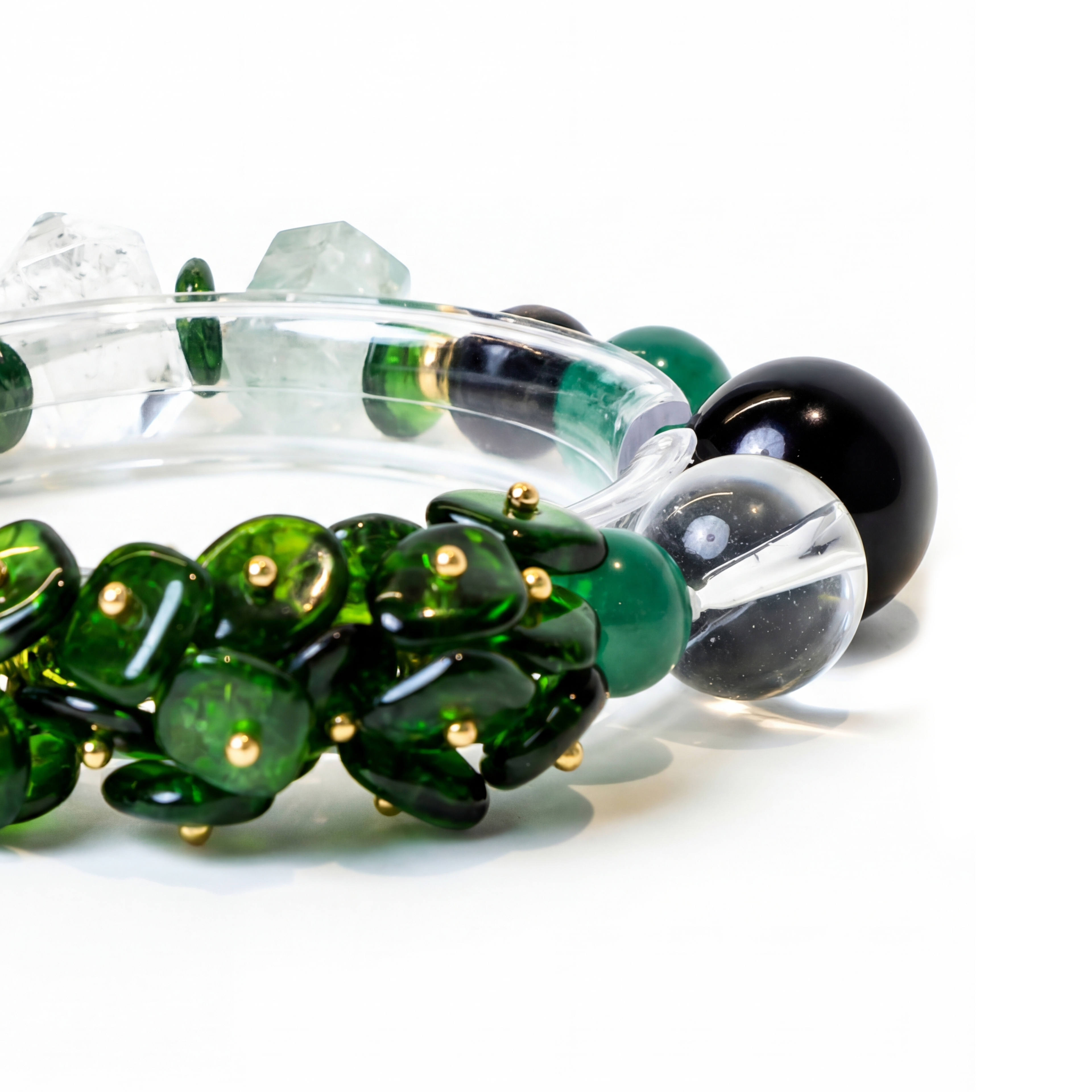 Close-up of the handcrafted Wood | Align bead bracelet focusing on the green and black beads